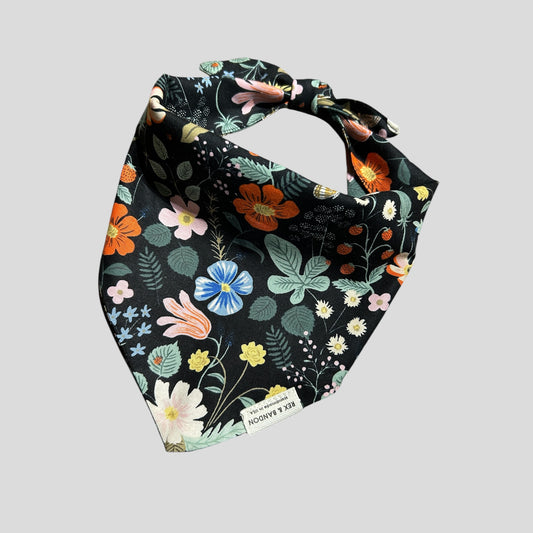 Floral-patterned bandana on a light black background