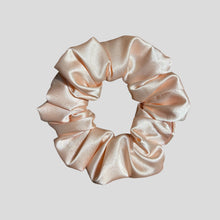 Load image into Gallery viewer, Pink satin scrunchie on a light gray background