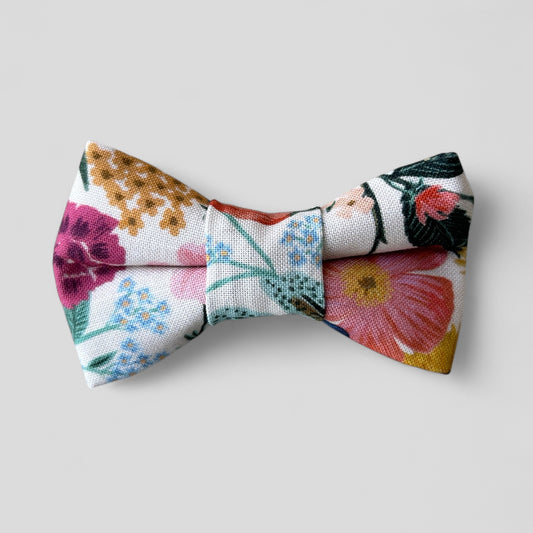 Floral patterned bow tie on a light gray background