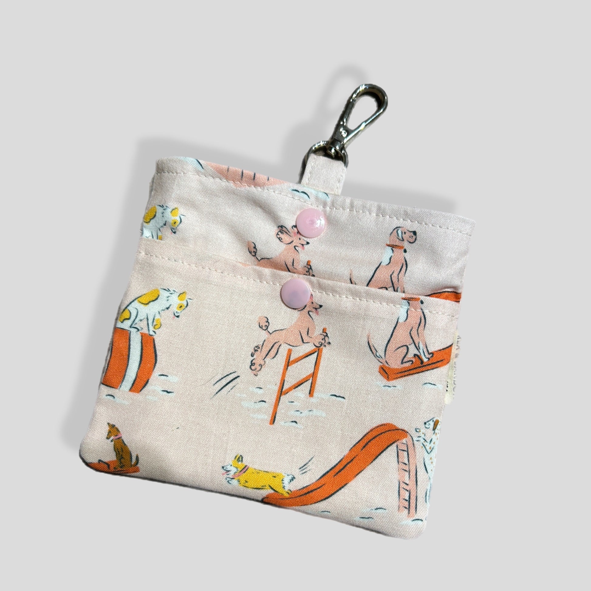Small pouch with cartoon dog design on a white background