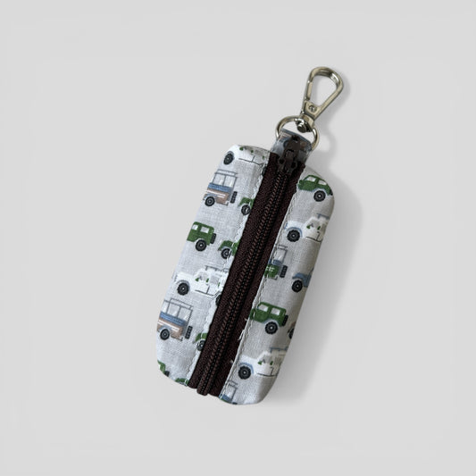 safari jeep dog poop bag on a light gray background